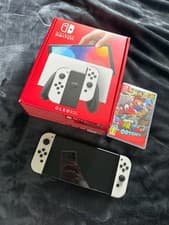 Image of Nintendo Switch OLED + Super Mario Odyssey Game