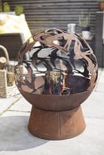 Image of La Hacienda Swallow Globe Patio Fire Pit Oxidized Steel