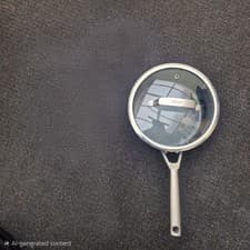 Image of 20 Cm Ninja Zerostick Saucepans with a tempered glass lid.