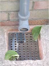 Image of Stylish 2-Pack of 15x15cm Stainless Steel Swirl Drain Covers for Outdoor Use