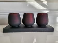 Image of Hestia Set of 3 Glass Votive Tea Light Holders On Wooden Plinth