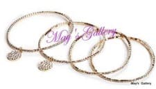 Image of GUESS Jeans Rhinestones Bangle Bracelet Gold Tone Charms Pave Logo Set of 4