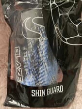 Image of Sondico Blaze White Blue Black Slip In Shin Pads Size Large Brand New