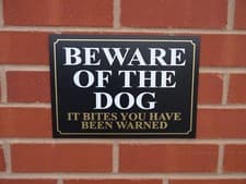 Image of BEWARE OF THE DOG IT BITES YOU HAVE BEEN WARNED sign or sticker 4 sizes guard