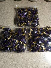 Image of 1 kilo of CADBURY CHOCOLATE ECLAIRS Caramel Milk Choc Toffee Retro Sweets