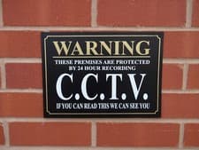 Image of WARNING PREMISES PROTECTED 24 HOUR CCTV IF YOU CAN READ THIS sign or sticker