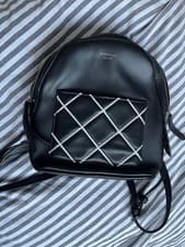 Image of Fiorelli backpack womens, black with black and white crosshatching on pocket