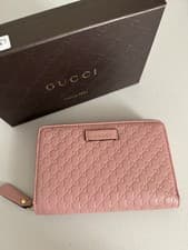 Image of GUCCI Pink Micro-Guccissima Embossed Leather Compact Zippy Wallet 449423