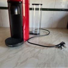 Image of Red Magimix Nespresso Vertuo Plus Coffee Machine + 4 Glasses & 4 Spoons