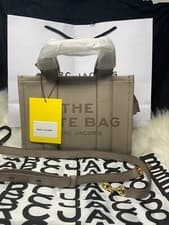 Image of Marc Jacobs Small Tote Crossbody/ 100% Leather  The Tote This Season in Cement