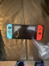 Image of Nintendo Switch 32GB with SD card and charging dock with 2k22