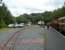 Image of PHOTO HERE COMES THE GUARD DEVIL'S BRIDGE RAILWAY STATION STRIDING ALONG THE SI