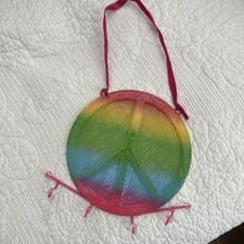 Image of Claire's Metal Rainbow Colored Peace Sign Jewelry Holder Wall Hanging