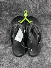 Image of Crocs Crocband Flip Flops thong sandals in black Unisex