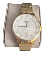 Image of rotary  ultra slim mens watch  brand new in a gold colour with box.
