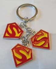 Image of Superman Man of Steel Logo DC Comics Keyring with 3 Charms UK Seller Free P&P