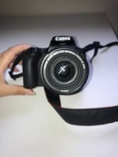 Image of Canon EOS 250D 24.1MP DSLR Camera - Black (Kit with EF-S 18-55mm f/4-5.6 IS STM