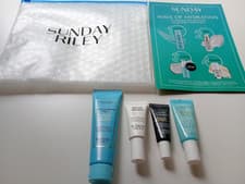 Image of SUNDAY RILEY SKINCARE GIFT SET EYE CREAM, FACE CLEANSER, SERUM, TREATMENT & BAG