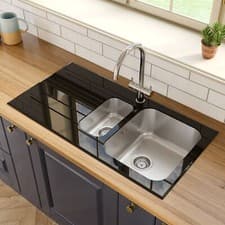 Image of 1.5 Bowl Kitchen Sink with Black Glass Surround and Left Hand Drainer Silver