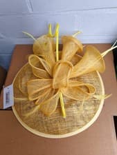 Image of Sinamay Petunia Flower Fascinator with A Saucer Base