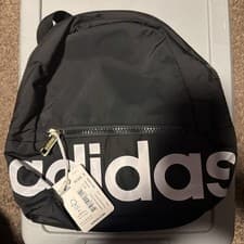 Image of ADIDAS MINI LINEAR BACKPACK BAG BLACK WHITE GOLD 8.5"H x 10.5"W x 5"D NWT 