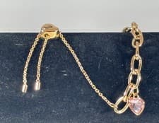 Image of Juicy Couture Charm Bracelet - Gold Colour with Pink Glass Charms