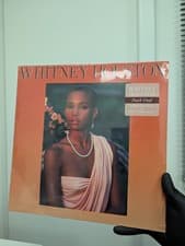 Image of 'Whitney Houston' by Whitney Houston (Peach VINYL) New and Sealed Bent Cover