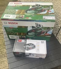 Image of Brand New Bosch Universal Chainsaw 18v Comes With Battery And Charger