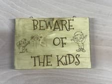 Image of Beware Of The Kids Funny House Sign. Finished with varnish for outdoor use