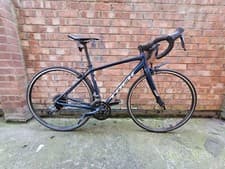 Image of Trek Domane al 2 unisex road bike in  Mulsanne Blue 