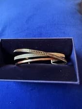 Image of New in Box Swarovski Sparkling White/Black Crystals bangle Gold Tone plated