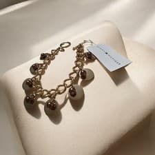 Image of Vintage Tommy Hilfiger Gold Tone Dangle Toggle Adjustable 7½" Cha Cha Bracelet