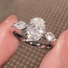Image of Oval & Pear Cut Moissanite Three Stone Engagement Ring In 14K White Gold Plated