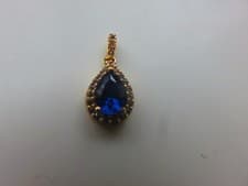 Image of Yellow Gold Blue Sapphire Pendant 9 Carat With CZ Pear Shape