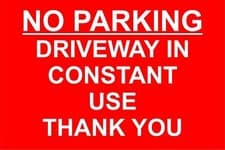 Image of No parking driveway in constant use safety sign
