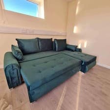 Image of faux leather sofa bed 3 seater
