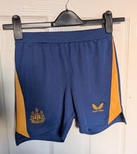 Image of Newcastle United Away Shorts 2022/23 Kids JM Castore Yellow Navy NUFC Football