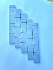 Image of Self adhesive plastic coated zinc plated wheel weights 5 & 10g x 5 strips
