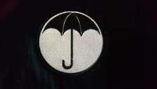 Image of THE UMBRELLA ACADEMY POLO SHIRT