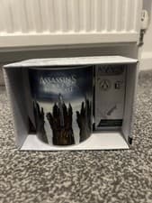 Image of Assassin's Creed Crest Gauntlet Logo Coffee Mug Tea Cup - Boxed
