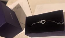 Image of Brand new Swarovski Infinity Heart Bracelet Rhodium Plated, new with box.