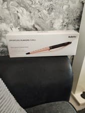 Image of BaByliss Rose Quartz Conical Curling Wand (25-13mm) with packaging 