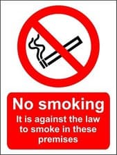 Image of No smoking it is against the law to smoke in these premises sign