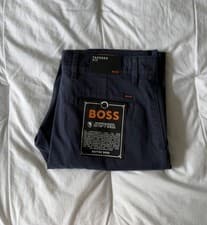 Image of Mens Hugo Boss tapered fit chino trousers navy blue w32” l32” New With Tags