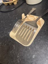 Image of kitchen utensil holder available in different colours  