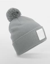 Image of Beechfield Appliqué Patch Self-Coloured Pom Pom Beanie