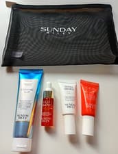 Image of SUNDAY RILEY SKINCARE GIFT SET FACE OIL, CLEANSER, SERUM, TREATMENT, BRANDED BAG