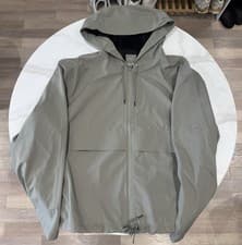 Image of Rains Suva hard shell short string beige jacket