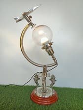 Image of Antique Glass Ball Airplane Top Table Lamp on Lion Nautical Compass Round Base