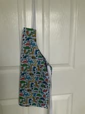 Image of DINOSAUR PRINT CHILDS HANDMADE DOUBLE SIDED APRON
